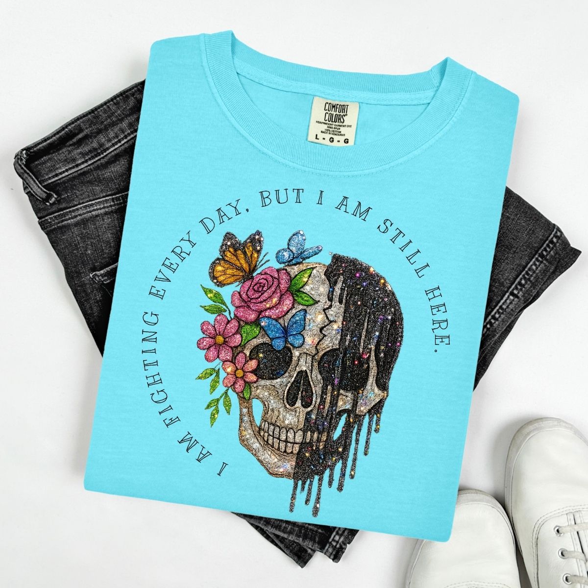 I AM FIGHTING EVERY DAY, BUT I AM STILL HERE - BLACK TEXT W/ FAUX GLITTER SKELLIE