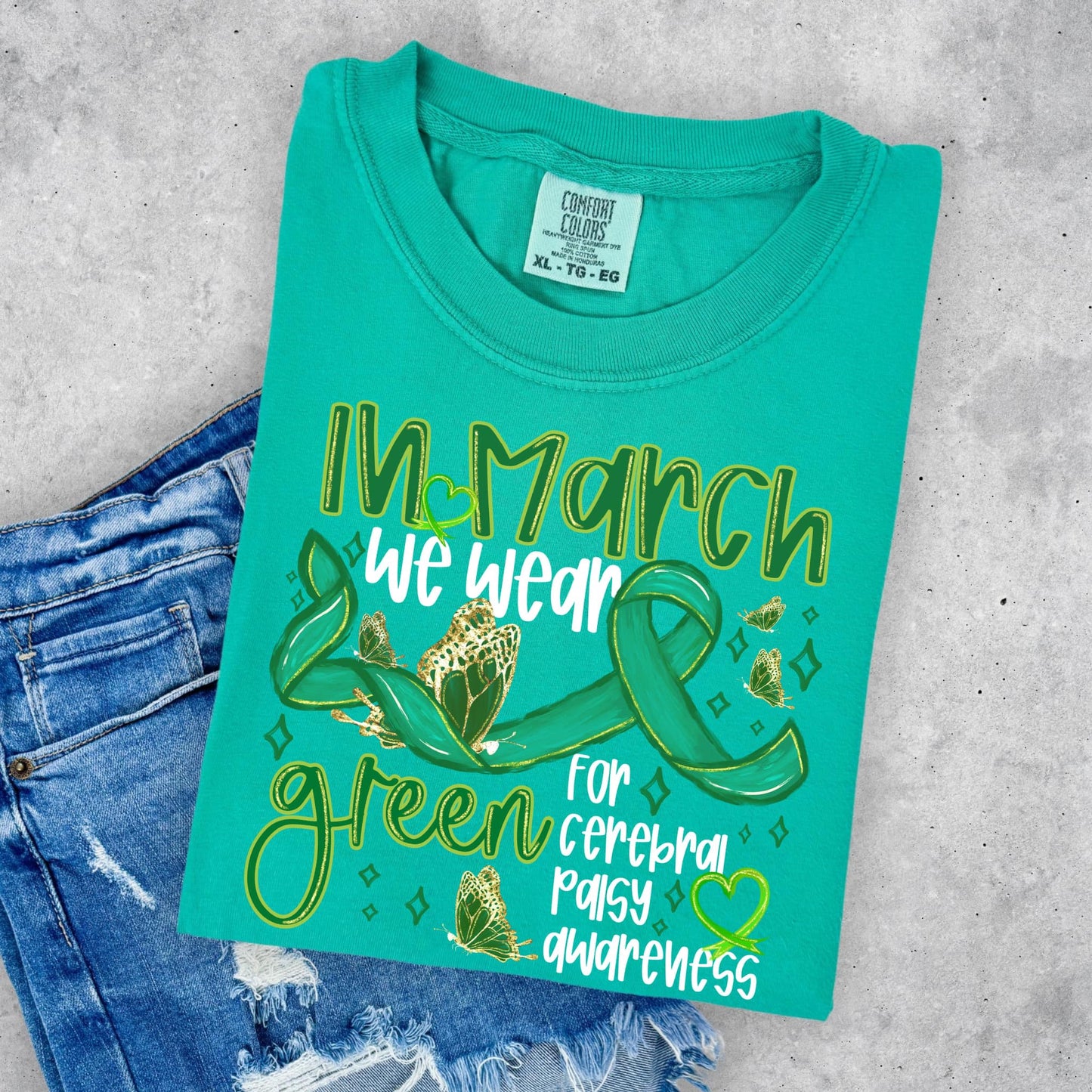 In March we wear green for Cerebral Palsy Awareness (white letters)-Ollie & Co.