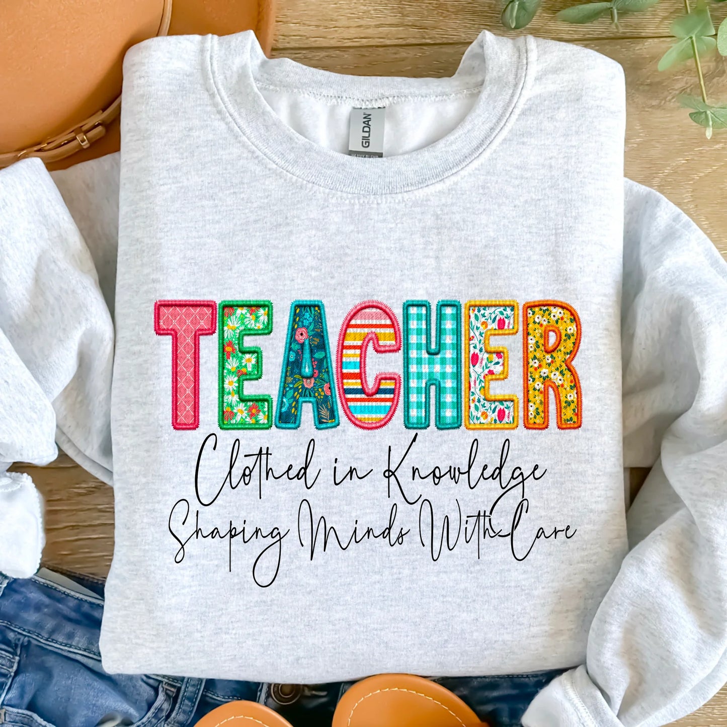 Teacher- Clothed in knowledge shaping minds with care