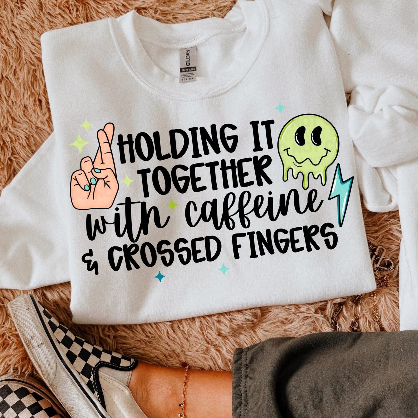 HOLDING IT TOGETHER WITH CAFFEINE & CROSSED FINGERS