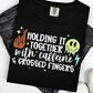 HOLDING IT TOGETHER WITH CAFFEINE & CROSSED FINGERS