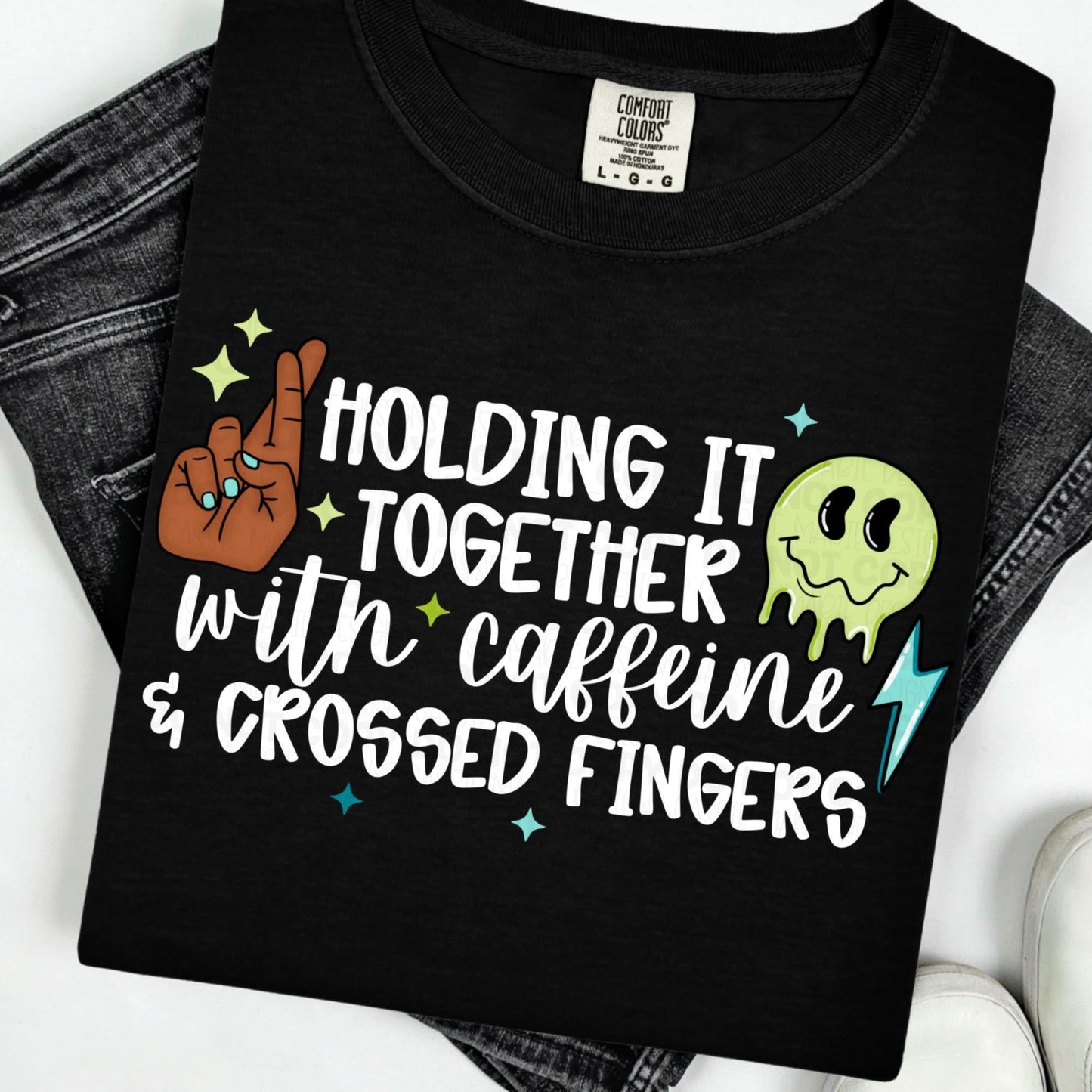 HOLDING IT TOGETHER WITH CAFFEINE & CROSSED FINGERS